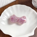 Eleganter helllilafarbener Haarclip mit Acrylschleife, Silberkanten und Glitzerelementen - Lila / 6.5cm