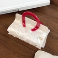 Elegant cream acetate hair claw clip with contrast wine red handle and French engraving - Gem White