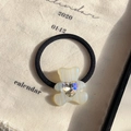 Elastic hair tie featuring a beige resin bear charm with a heart-shaped crystal - Luminous White
