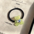 Elastic hair tie featuring a light green acetate bear with a heart crystal - Fluorescent Green