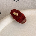 Detail of red tweed hair clip with golden peanut charm and festive 福 symbol - Good Fortune Peanut Duckbill Clip