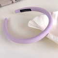 Detailed view of the handmade label and textured lavender fabric on the thick headband - Lavender Solid Basic (1# 26698D)