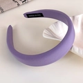 Detail shot of a lilac sponge headband featuring a black handmade label on the inner side - Lavender Matte Fabric (6# 26883C)