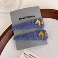 Dettaglio di fermagli per capelli in peluche blu con ciondoli a forma di cavallo d'oro - Set da 2 pezzi / Blu