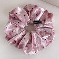 Detail of pink velvet polka dot scrunchie with handmade label and soft texture - Pink Large