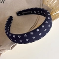 Detailed macro view of the navy blue floral headband fabric and handmade inner lining - Sapphire Blue