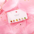 Detail view of 6-pair colorful strawberry stud earrings set on a pink feather background - Enamel Strawberry Style (13818D Silver Post)