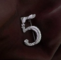 Elegant silver-toned brooch in number 5 shape encrusted with sparkling crystals - Silver