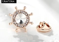 Macro detail of a rose gold helm brooch with rhinestones and 1.9cm size marking - Ship Helm (X0234) / 1.9cm x 1.9cm / White