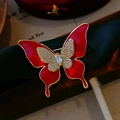Elegant red enamel butterfly brooch with sparkling crystals and gold accents for women - Red Butterfly Style