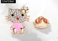 Macro view of Hello Kitty brooch with sparkling rhinestones and pink enamel finish - Cartoon Cat (X0234) / 1.7cm x 2.0cm / Pink