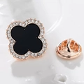 Macro view of clover brooch with black enamel and sparkling rhinestones and butterfly clasp - Clover (X0234) / Black