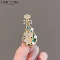 Elegant lute insect brooch with abalone shell inlay, sparkling crystals, and pearls - Lute Shape / Gold