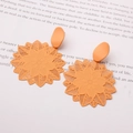 Elegant orange floral hollow earrings with matte oval studs in a unique layered design - Orange