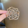 Exquisite hollow rose flower brooch with sparkling diamonds and gold-plated finish - Gold
