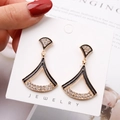 Elegant gold fan-shaped drop earrings with black enamel finish and sparkling crystals - Gold