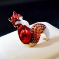 Elegant fox brooch with red enamel and vibrant gradient crystals in gold finish - Red