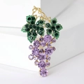 Elegant gold vine grape brooch with purple crystals and green enamel leaf accents - Light Purple Grape Style