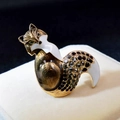 Elegant fox brooch in gold-tone alloy with white enamel and colorful crystals - Black