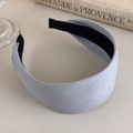 Detail of light blue fabric headband showing twill texture and anti-slip black lining - Light Blue