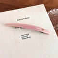 Close-up of minimalist light pink acetate hair clip with golden metal accent and sleek finish - Pastel Pink (27606A)