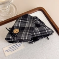 Detailed view of British vintage plaid hair clip with wooden button and bow ornament - Black
