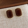 Close-up of vintage square velvet stud earrings with brown flocking and gold twist frame - Brown Large Rectangle