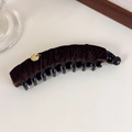 Detailed close-up of dark brown velvet banana hair clip with a handmade gold charm tag - Brown Banana Clip (27720B)