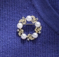 Elegant gold floral brooch with white pearls and rhinestones on blue knit sweater - Gold Wreath Style (X01689)