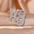 Detail shot of the silver-tone metal WANG brooch encrusted with sparkling rhinestones - Silver