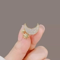 Elegant gold celestial moon and star brooch with white zircon pave setting - Gold