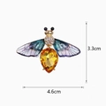 Sparkling insect brooch with yellow gemstone and blue wings, 4.6cm wide accessory - Purple