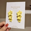 Floral yellow earrings featuring three stacked 3D flowers on a 925 silver needle post - Yellow