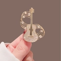 Eleganter goldener Gitarren-Anstecker mit funkelnden Kristallen und Musiknoten-Design - Gitarre Musiknote (X0395)