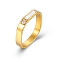 Elegant gold titanium ring with rectangular shell inlay and square diamond accent on white - Size 7 / Gold
