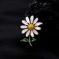 Elegant white daisy brooch pin with golden stem on black stone, minimalist floral jewelry - Daisy Flower Style