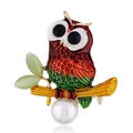 Detail of owl brooch with red-green gradient enamel and a large round white pearl - Gold Dark Red