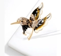 Golden hummingbird brooch with black and white enamel and sparkling rhinestones - Black