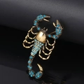 Spilla a scorpione vintage dorata con cristalli blu per vestiti e magliette chic - Forma Scorpione (Oro Antico + Strass Blu)