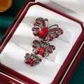 Juego de tres broches de mariposa con diamantes de imitación rojos en plata antigua para mujer - Rojo