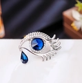 Evil eye crystal brooch in silver with blue central stone and teardrop crystal - Silver