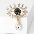 Broche de lujo ojo turco dorado con diamantes de imitación brillantes y cristal de pera - Negro