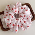 Detailed macro view of strawberry print hair scrunchie with soft ruffled seersucker texture - Large Hair Tie (27270B)