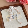 Dettaglio di ciondoli fatti a mano in perle e cristalli rosa per zoccoli e scarpe jelly - Nappa in Cristallo Rosa Bianco Perla (27243-25)