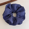 Detail of navy blue polka dot chiffon scrunchie with soft pleats and elastic texture - Round Scrunchie (27275A)
