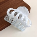 Detailed macro view of white translucent marble hair claw with high-quality resin texture - Blue Multi-tooth