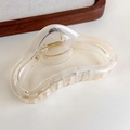 Macro shot of minimalist transparent acrylic cloud hair claw with gold metal spring - Transparent White Half-Circle (27315S)