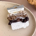 Detailed macro view of three earth-toned satin scrunchies on a branded card - Set of 3 / Apricot Coffee Brown (27346E)