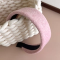 Close-up of thick pink wool-like headband with soft texture and non-slip lining - Pink