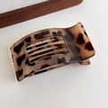 Close-up of tortoise shell leopard hair claw clip showing amber resin texture and teeth - Light Leopard Square Clip (27373B)